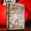 Bật Lửa Zippo Đồng Mạ Chrome Khắc Rồng Cuộn